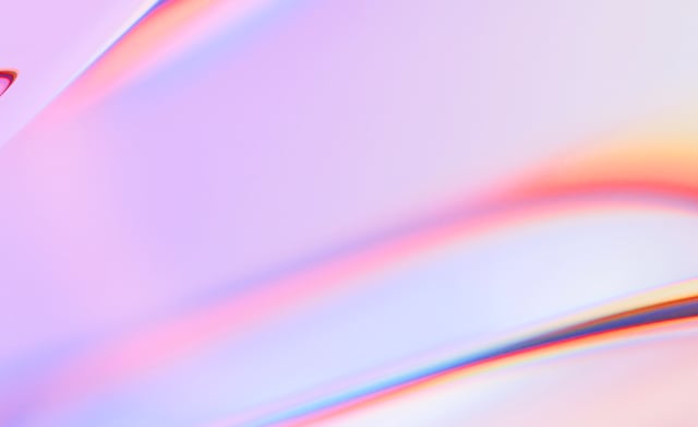 Abstract image of soft pink and lilac gradients crossed by curved bands of refracted rainbow light, with a pale white edge entering at top left